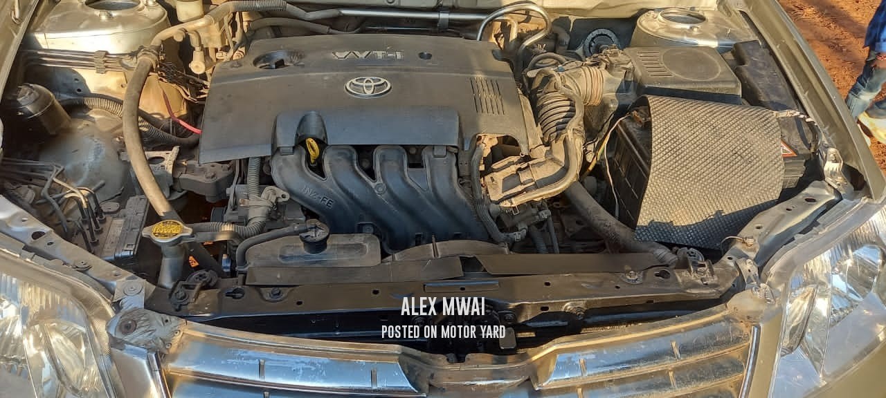 Toyota NZE 2013 Silver