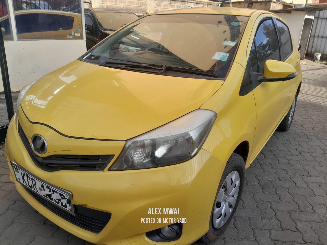Toyota Vitz 2012 Yellow
